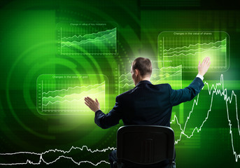 Businessman using media interface