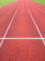 Jogging track, outdoor oval stadium with a tartan track.