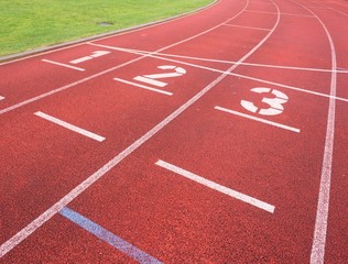 Number one and number two, red rubber running racetrack