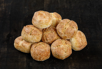 bread rolls on wooden background