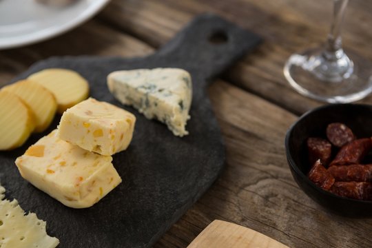 Variety of cheese on slate plate