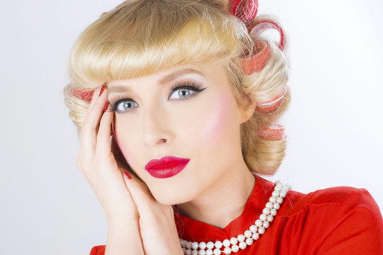 Pin-up woman with curler