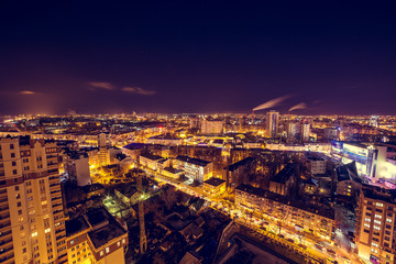 Fototapeta na wymiar Voronezh downtown. Night cityscape from rooftop. Houses, night lights