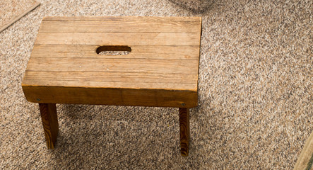 Small wooden step stool.