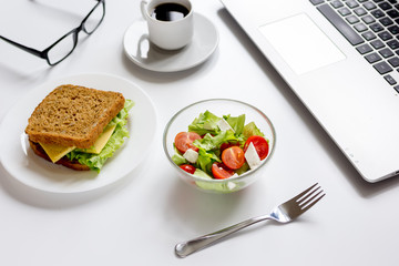 concept of lunch in officeat work top view