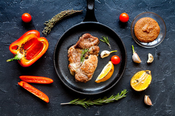 concept cooked steak on dark background top view