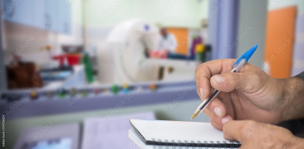Poster composite image of close up of man writing in notepad