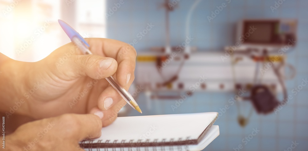 Poster composite image of close up of man writing in notepad