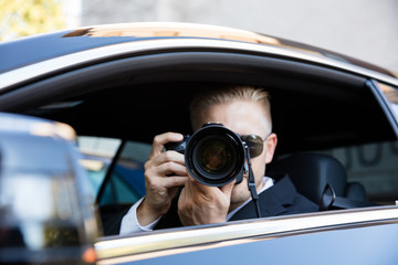 Man Photographing With SLR Camera - obrazy, fototapety, plakaty