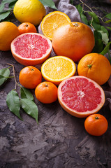 Dissected fresh fruits. Orange, grapefruit and tangerines