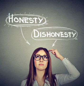 Woman making a decision honesty vs dishonesty