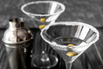 martini cocktail at wooden background close up