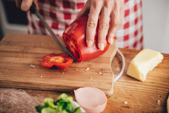 Woman slicing paprika