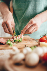 Woman preparing pizza