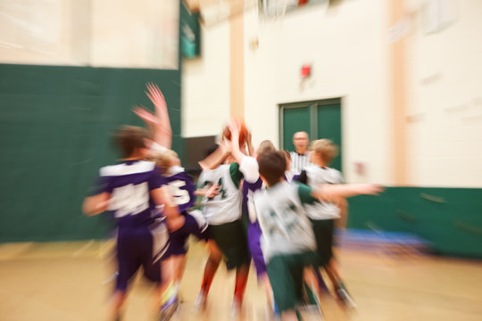 Youth basketball motion blurred image, lens effect.