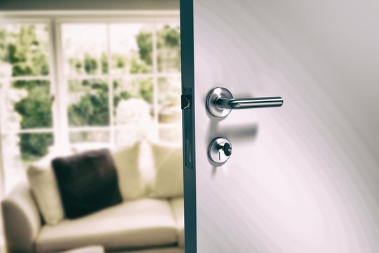 Composite image of closeup of metal doorknob and lock with key