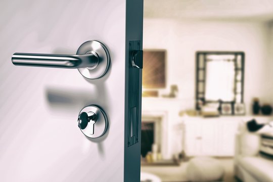 Composite image of closeup of wooden door with metallic doorknob