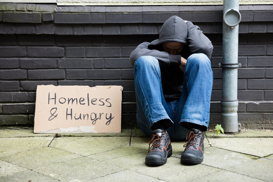 Homeless And Hungry Man