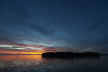 Raja Ampat Island at Sunset. There are around 1,500 uninhabited and remote islands in the Raja...
