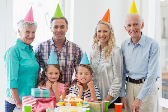 Happy multi- generation family celebrating a birthday