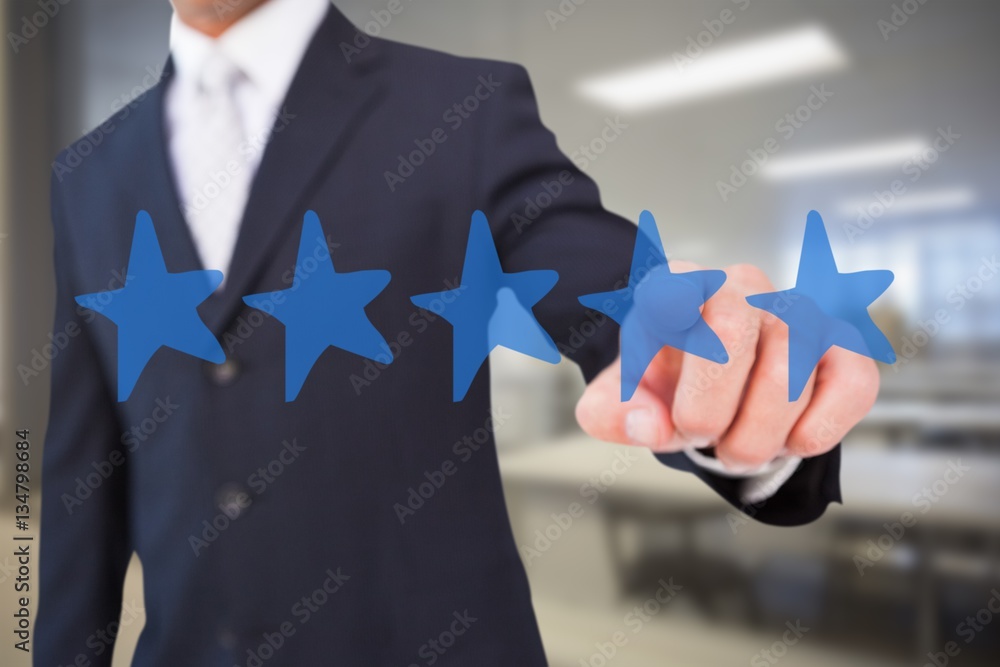 Poster composite image of smiling businessman in suit pointing