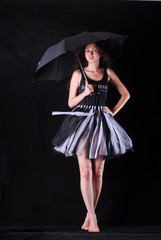 model posing with an umbrella in the studio