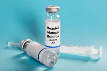 Measles Mumps Rubella Vaccine Vials With Syringe - obrazy, fototapety, plakaty