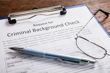 Criminal Background Check Application Form With Pen