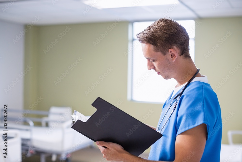 Canvas Prints Doctor writing on clipboard