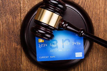 Credit Card On Wooden Gavel