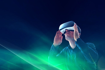 The man with glasses of virtual reality. Future technology concept.