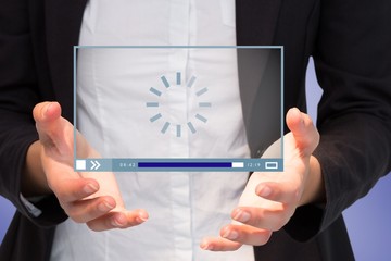 Composite image of businesswomans hands presenting 3d