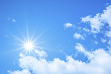 Naklejka na ściany i meble blue sky background with the bright sun