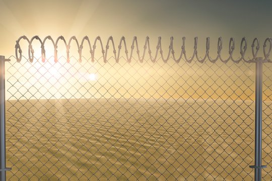 Composite image of chainlink fence against  white background