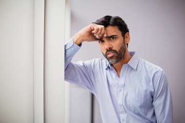 Stressed businessman at conference centre