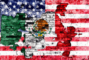 flags of USA and Mexico painted on cracked wall