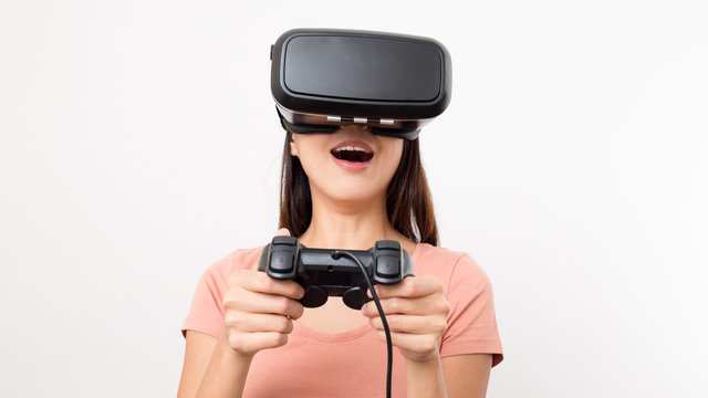 Woman play game with Virtual reality glasses