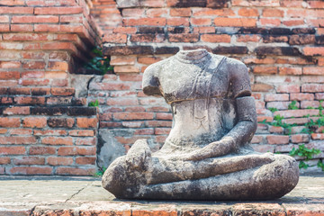 Fototapeta na wymiar Buddha statue in the historical Park of Ayutthaya, Phra Nakhon Si Ayutthaya, Thailand