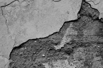 Fototapeta premium Wall fragment with scratches and cracks