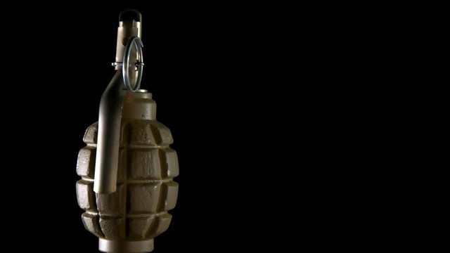grenade rotates on a black background