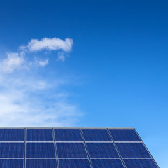 Solar panels against blue sky