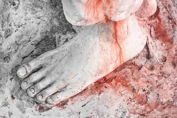 Foot of Christ bloodied