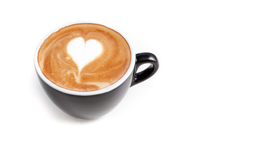 Coffee cup of heart shape latte art on white background isolated