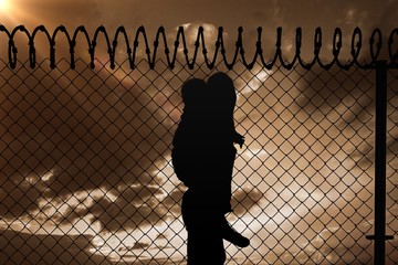 Composite image of portrait of mother giving piggyback ride