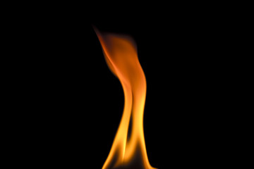 Detail of little flame on blackg background