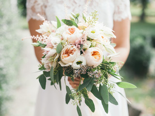 wedding bouquet in bride's hands, david austin