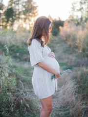 pregnant woman standing 