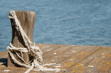wooden post on the dock