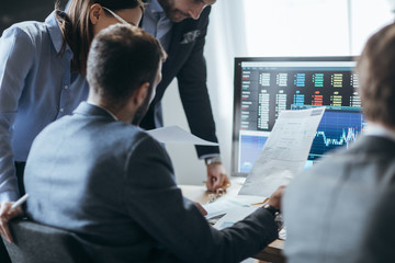 Financial managers working at their office.