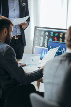 Financial managers working at their office.